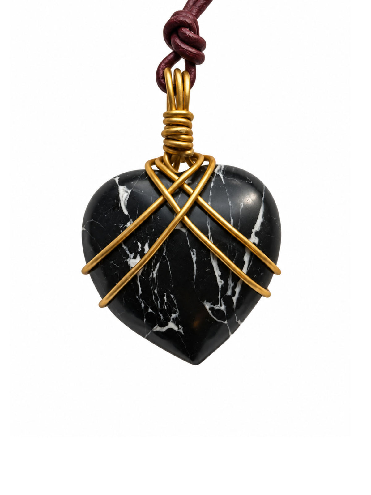 Black Marquina marble heart pendant wrapped in gold tone wire on a knotted burgundy leather cord
